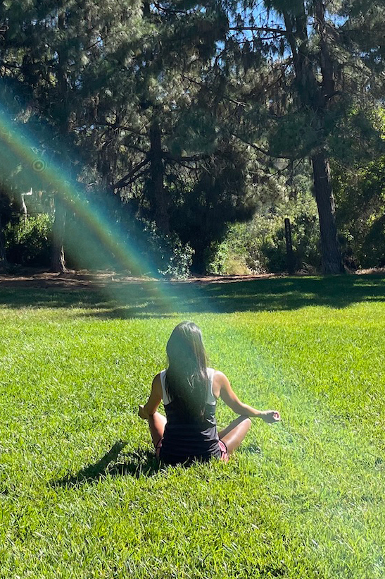 Josie meditating rainbow